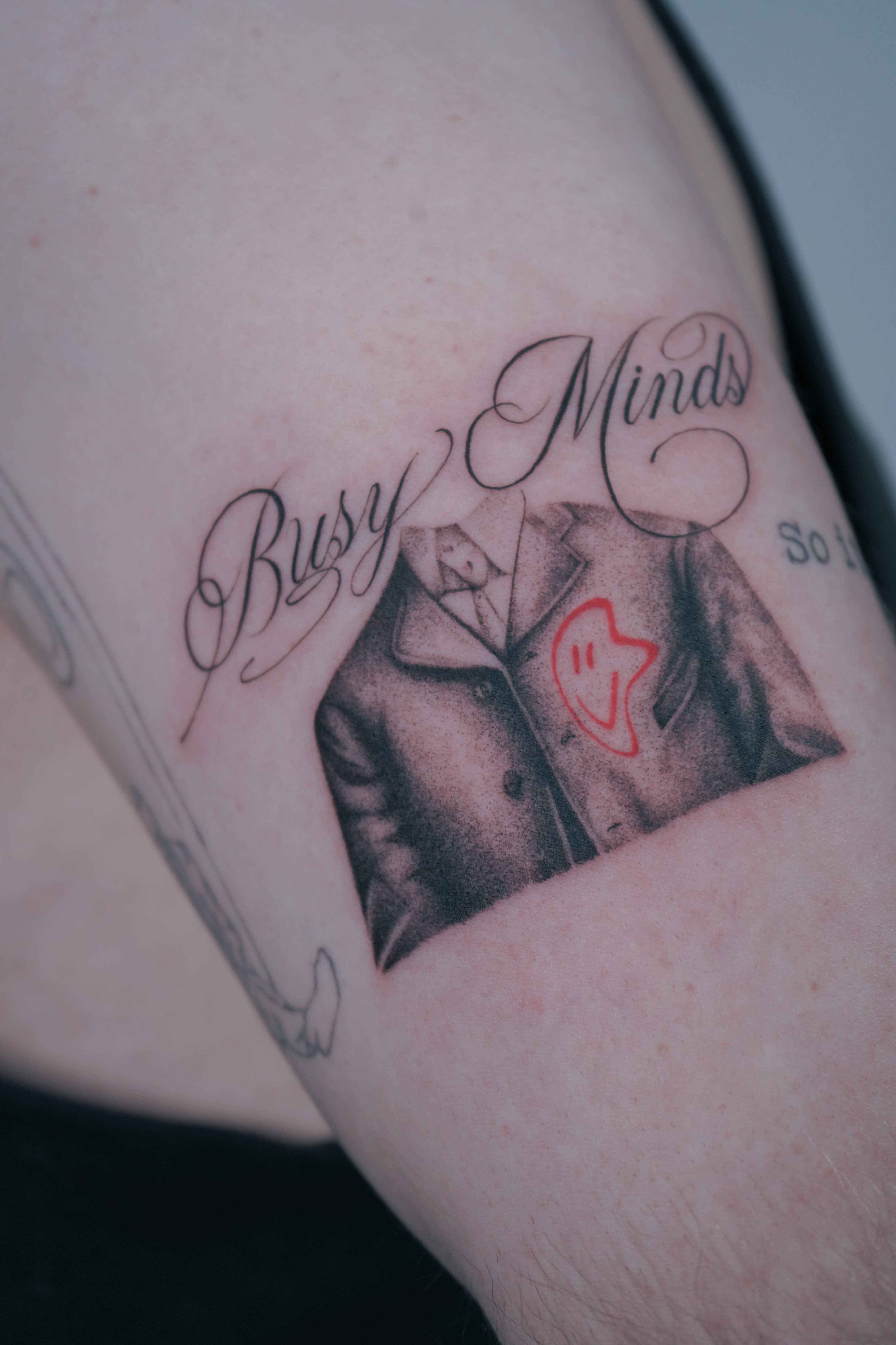 Delicate linework tattoo on arm